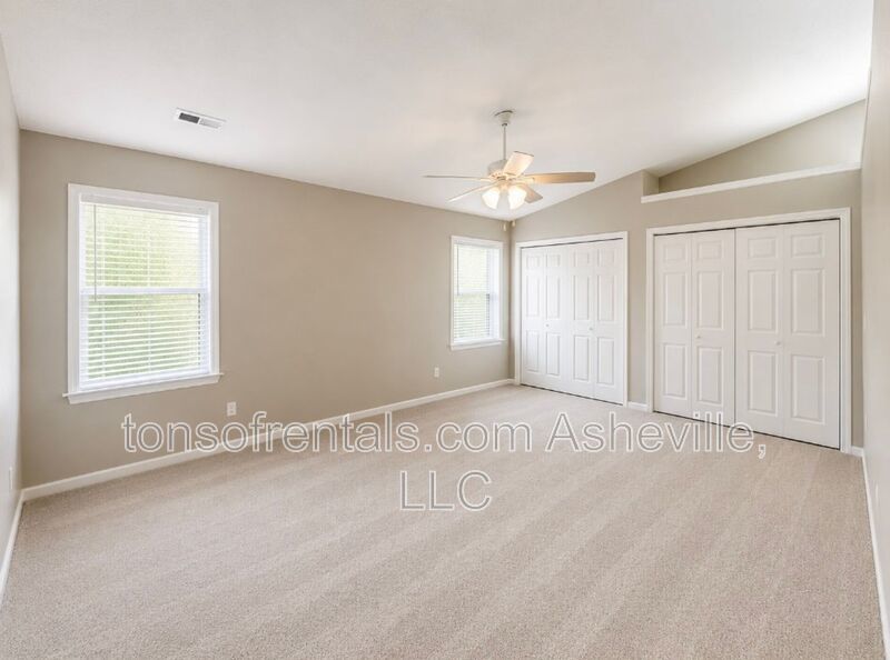 Welcome to this charming single-family home located in the beautiful town of Fletcher, NC. property image
