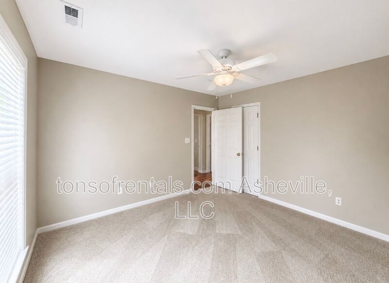 Welcome to this charming single-family home located in the beautiful town of Fletcher, NC. property image