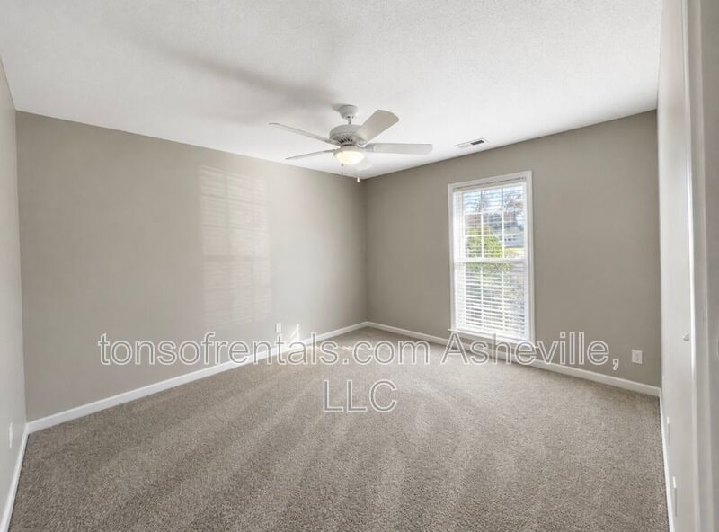 Welcome to this charming single-family home located in the beautiful town of Fletcher, NC. property image