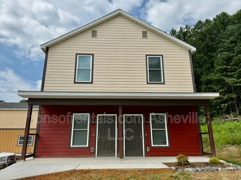 Freshly built upstairs duplex unit in Brevard, NC, offering a bright one-bedroom, one-bath layout with an open floor plan and vinyl flooring throughout. property image