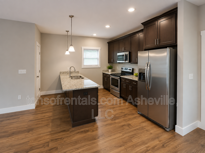 Charming 3BR Asheville Home | Updated Kitchen + Uncovered Deck | $1,995 property image