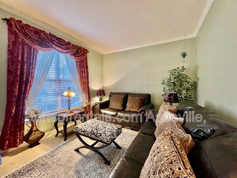 Welcome to this stunning 4-bedroom, 2.5-bathroom home located in the desirable Arden, NC area. property image