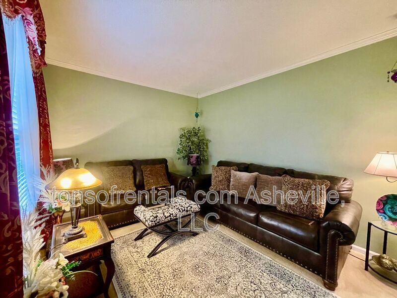 Welcome to this stunning 4-bedroom, 2.5-bathroom home located in the desirable Arden, NC area. property image