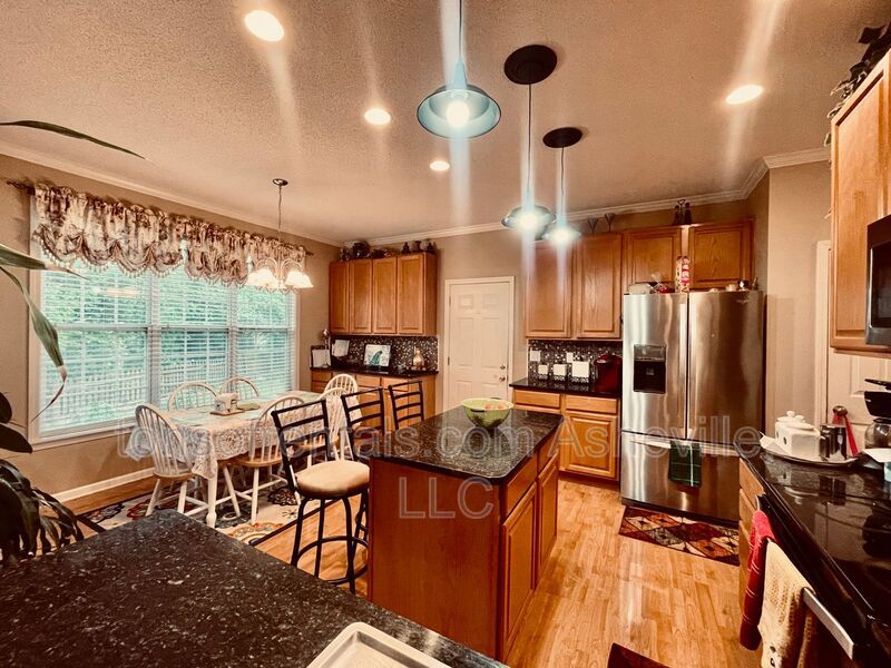 Welcome to this stunning 4-bedroom, 2.5-bathroom home located in the desirable Arden, NC area. property image