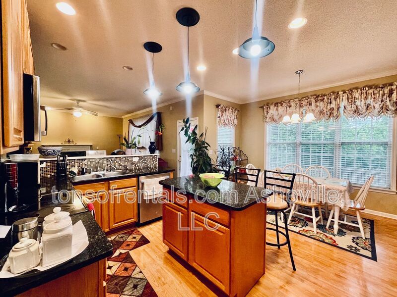 Welcome to this stunning 4-bedroom, 2.5-bathroom home located in the desirable Arden, NC area. property image