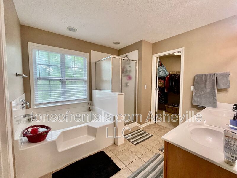 Welcome to this stunning 4-bedroom, 2.5-bathroom home located in the desirable Arden, NC area. property image