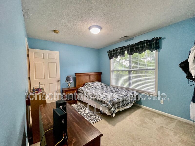 Welcome to this stunning 4-bedroom, 2.5-bathroom home located in the desirable Arden, NC area. property image