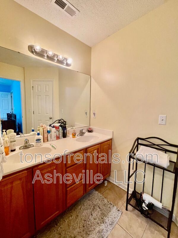 Welcome to this stunning 4-bedroom, 2.5-bathroom home located in the desirable Arden, NC area. property image