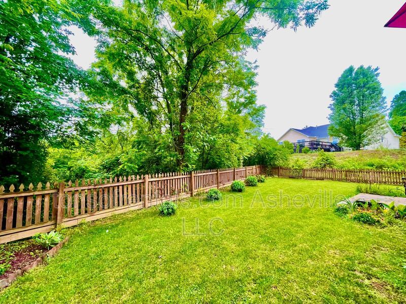 Welcome to this stunning 4-bedroom, 2.5-bathroom home located in the desirable Arden, NC area. property image