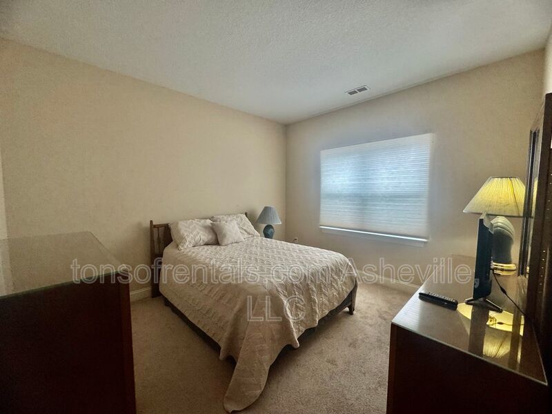 Welcome to a beautifully furnished 2-bedroom, 2-bathroom condo located in the charming town of Fletcher, NC. property image
