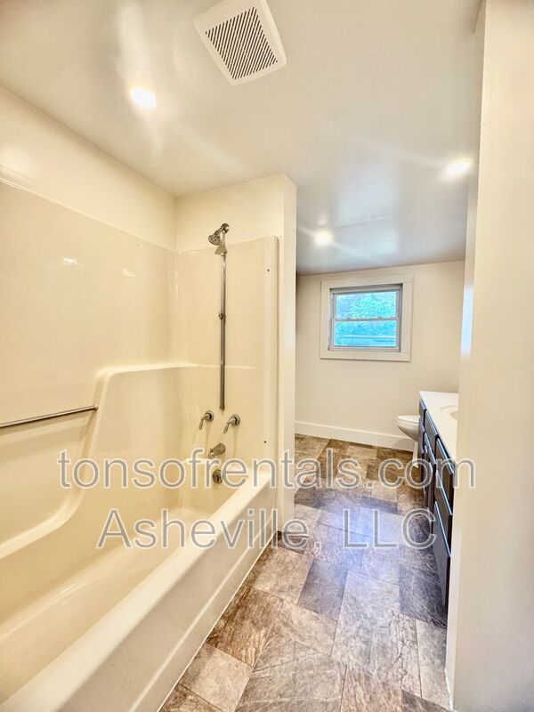 Welcome to 121 Oakdale Street, a charming 2-bedroom, 1-bathroom apartment located in the beautiful city of Brevard, NC. property image