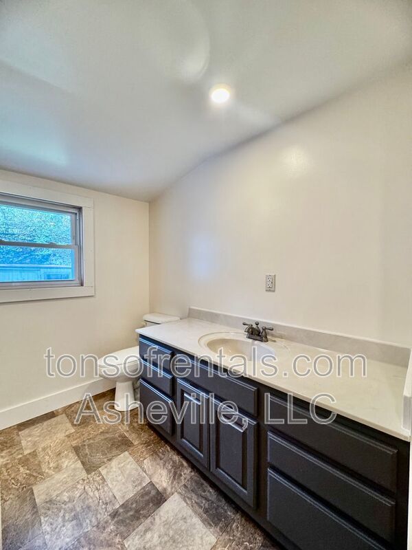 Welcome to 121 Oakdale Street, a charming 2-bedroom, 1-bathroom apartment located in the beautiful city of Brevard, NC. property image