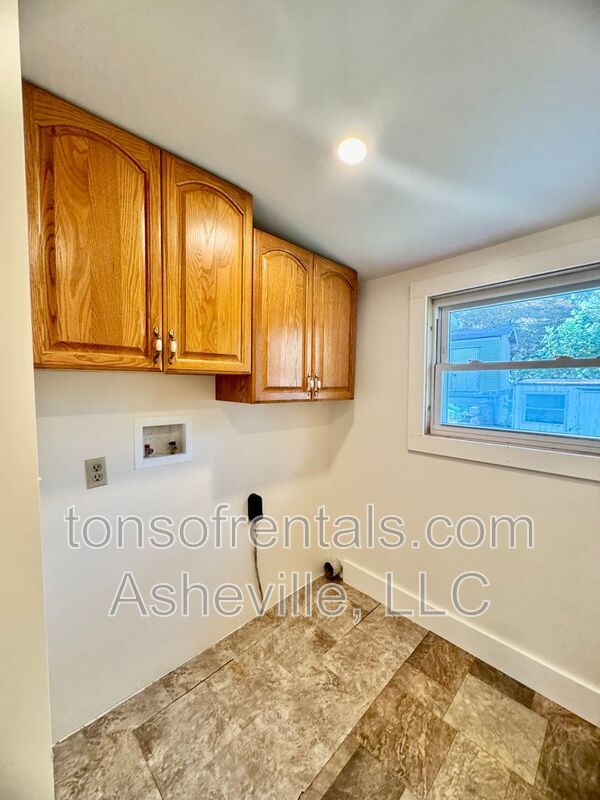 Welcome to 121 Oakdale Street, a charming 2-bedroom, 1-bathroom apartment located in the beautiful city of Brevard, NC. property image