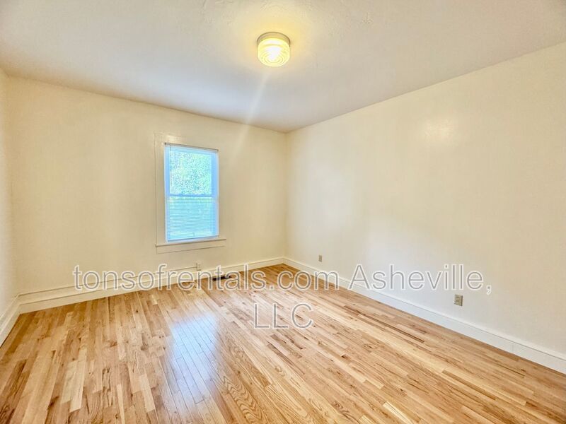 Welcome to 121 Oakdale Street, a charming 2-bedroom, 1-bathroom apartment located in the beautiful city of Brevard, NC. property image