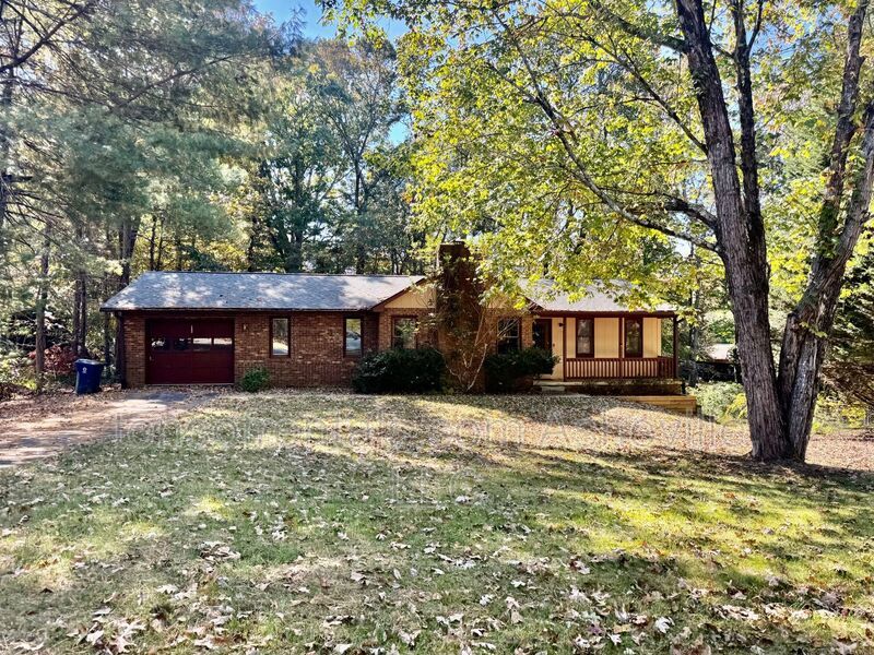 Welcome to 136 Atwood Drive, a charming 3-bedroom, 2-bathroom single-family home nestled in the heart of Hendersonville, NC! property image