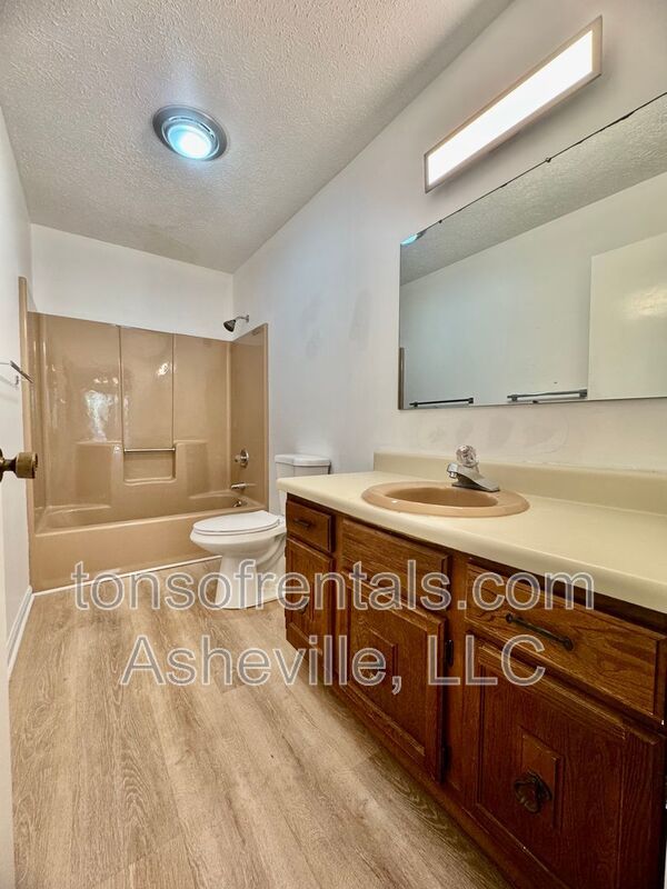 Welcome to 136 Atwood Drive, a charming 3-bedroom, 2-bathroom single-family home nestled in the heart of Hendersonville, NC! property image