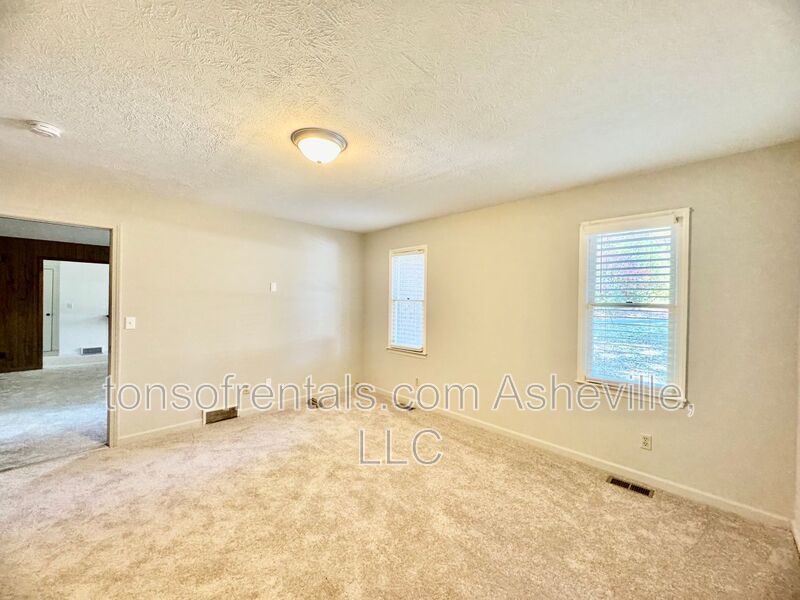 Welcome to 136 Atwood Drive, a charming 3-bedroom, 2-bathroom single-family home nestled in the heart of Hendersonville, NC! property image