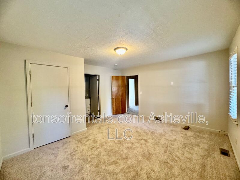 Welcome to 136 Atwood Drive, a charming 3-bedroom, 2-bathroom single-family home nestled in the heart of Hendersonville, NC! property image