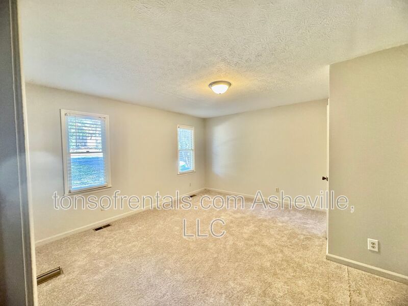 Welcome to 136 Atwood Drive, a charming 3-bedroom, 2-bathroom single-family home nestled in the heart of Hendersonville, NC! property image