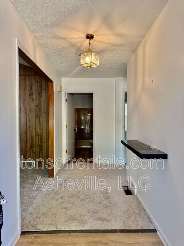 Welcome to 136 Atwood Drive, a charming 3-bedroom, 2-bathroom single-family home nestled in the heart of Hendersonville, NC! property image