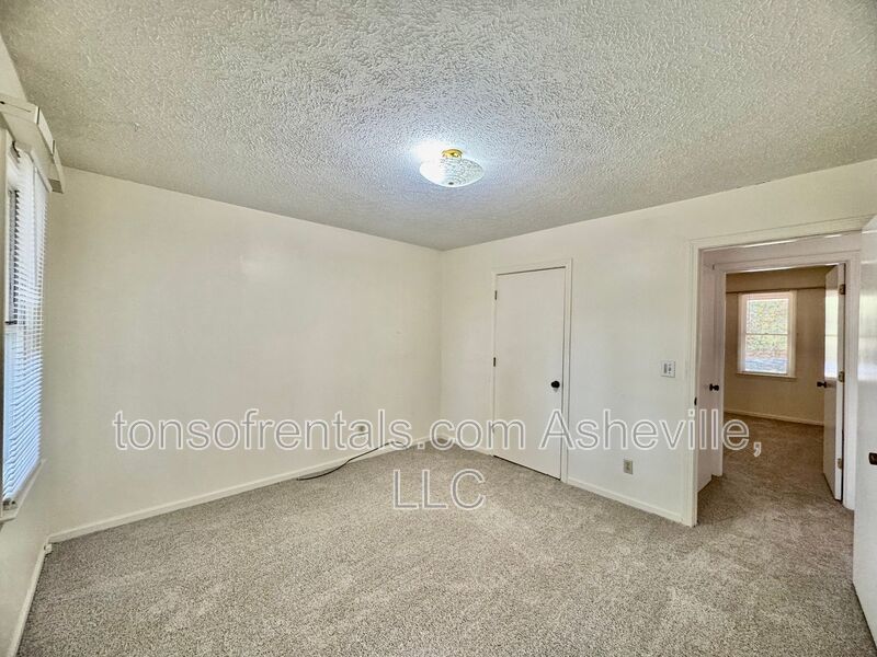 Welcome to 136 Atwood Drive, a charming 3-bedroom, 2-bathroom single-family home nestled in the heart of Hendersonville, NC! property image