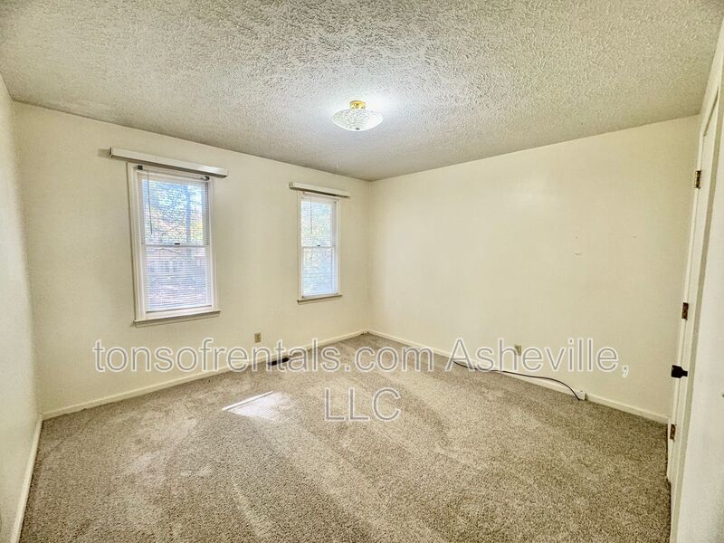 Welcome to 136 Atwood Drive, a charming 3-bedroom, 2-bathroom single-family home nestled in the heart of Hendersonville, NC! property image