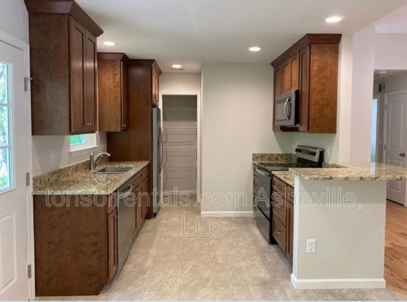 Welcome to this beautiful single level home located in Hendersonville, NC. This spacious home features 3 bedrooms and 2 full bathrooms, providing ample space for comfortable living. property image