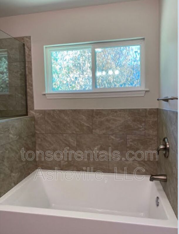 Welcome to this beautiful single level home located in Hendersonville, NC. This spacious home features 3 bedrooms and 2 full bathrooms, providing ample space for comfortable living. property image