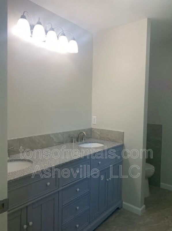 Welcome to this beautiful single level home located in Hendersonville, NC. This spacious home features 3 bedrooms and 2 full bathrooms, providing ample space for comfortable living. property image