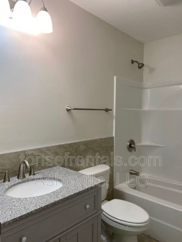 Welcome to this beautiful single level home located in Hendersonville, NC. This spacious home features 3 bedrooms and 2 full bathrooms, providing ample space for comfortable living. property image