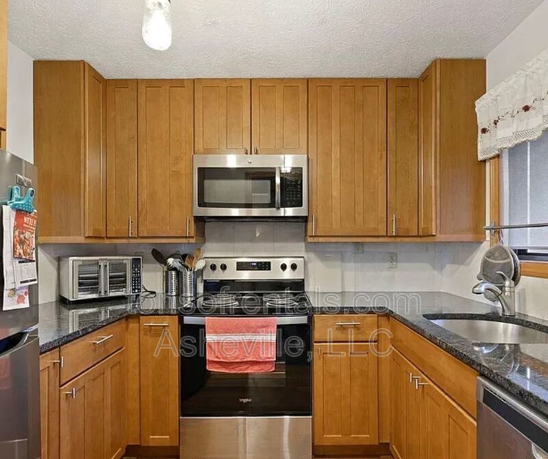 Welcome to this newly renovated, turn-key condo located in the desirable Willow Bend Subdivision, just a mile from downtown Hendersonville, NC. property image